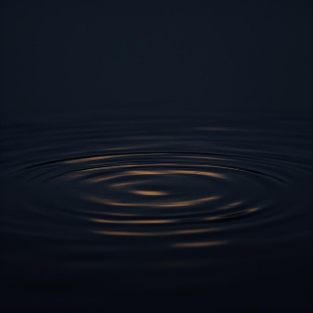 Dark, still water with concentric ripples catching faint golden light